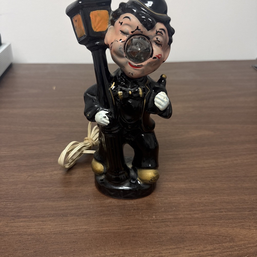 vintage 1950s ceramic "drunk hobo" figure lamp